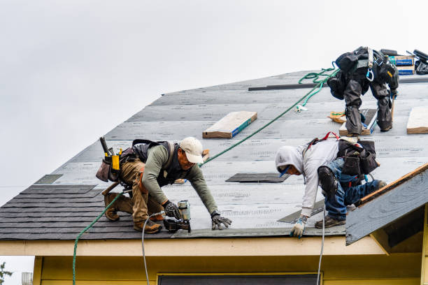 Professional Gutter Installation technician working in Riverhead, NY